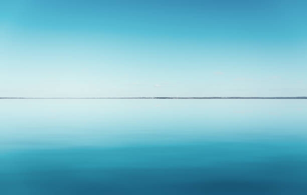 A calm lake at sunrise